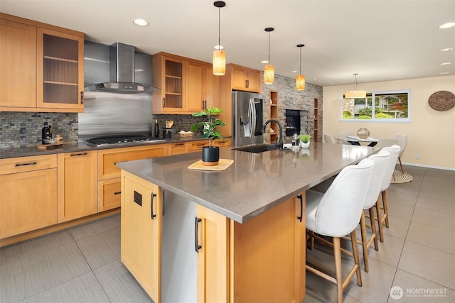 17905 3rd Ave NW, Shoreline, WA 98177 - kitchen with wall chimney exhaust hood, stainless steel appliances, backsplash, light tile patterned floors, and recessed lighting