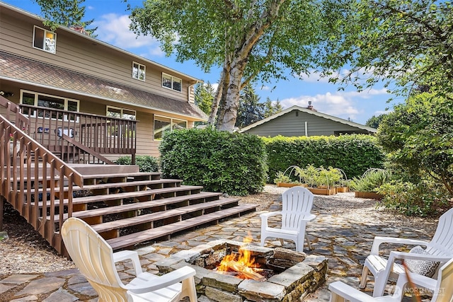 17905 3rd Ave NW, Shoreline, WA 98177 - view of patio / terrace featuring a fire pit and stairway