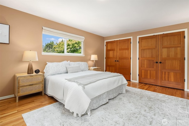17905 3rd Ave NW, Shoreline, WA 98177 - bedroom with multiple closets and wood finished floors