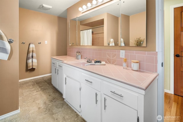 17905 3rd Ave NW, Shoreline, WA 98177 - full bathroom with vanity, backsplash, and curtained shower