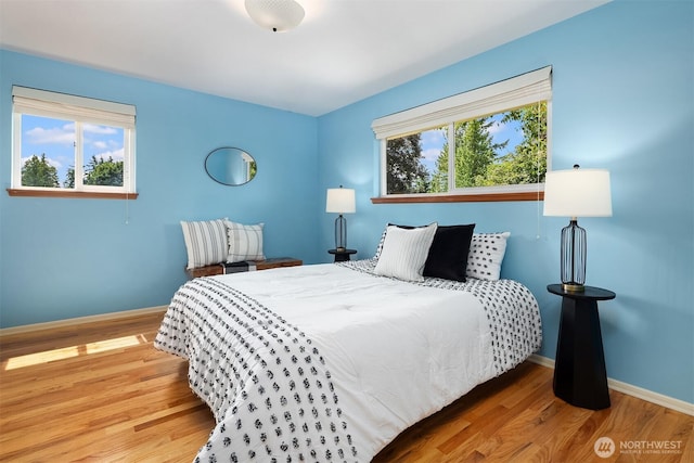 17905 3rd Ave NW, Shoreline, WA 98177 - bedroom featuring multiple windows and wood finished floors