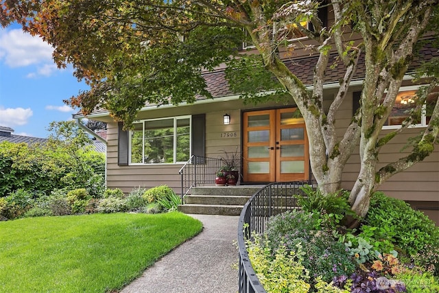 17905 3rd Ave NW, Shoreline, WA 98177 - doorway to property featuring a yard and french doors