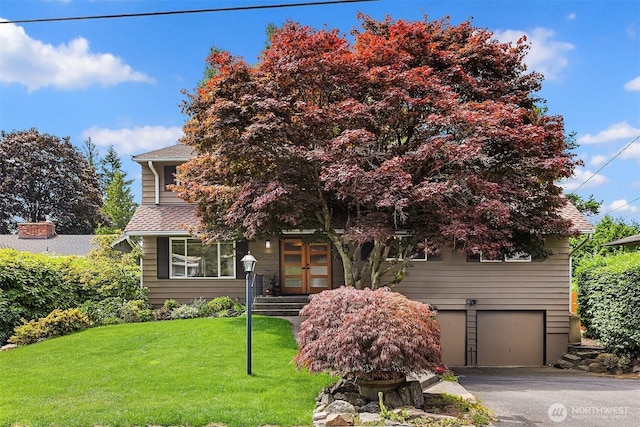 17905 3rd Ave NW, Shoreline, WA 98177 - view of front facade with french doors, a garage, a front lawn, and driveway