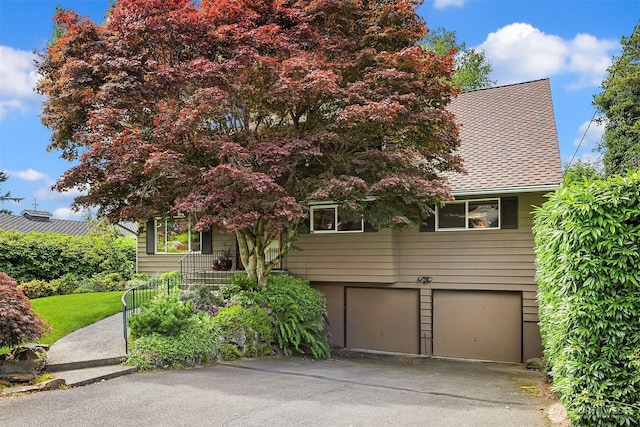 17905 3rd Ave NW, Shoreline, WA 98177 - tri-level home with an attached garage and driveway
