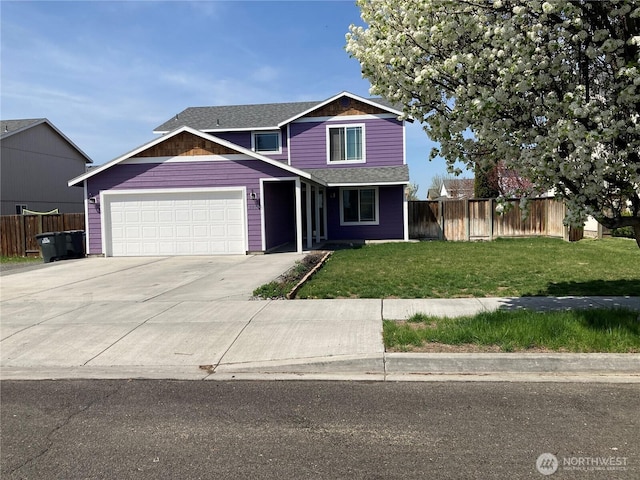 2020 Perch Ave, Moses Lake, WA 98837 - traditional-style home with a garage, driveway, and a shingled roof