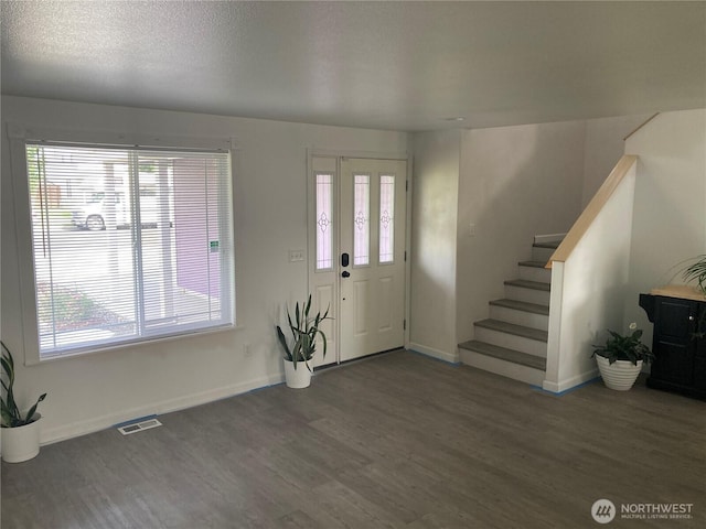 2020 Perch Ave, Moses Lake, WA 98837 - foyer featuring wood finished floors, stairs, and plenty of natural light