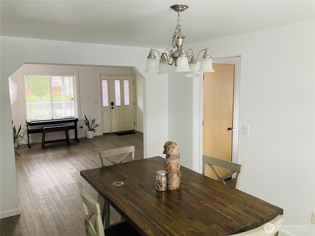 2020 Perch Ave, Moses Lake, WA 98837 - dining room featuring a chandelier and wood finished floors