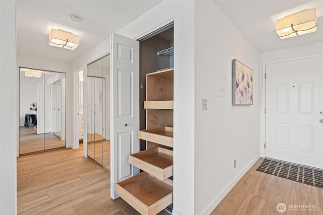 411 N 90th St Unit 406, Seattle, WA 98103 - foyer with light wood-type flooring and baseboards