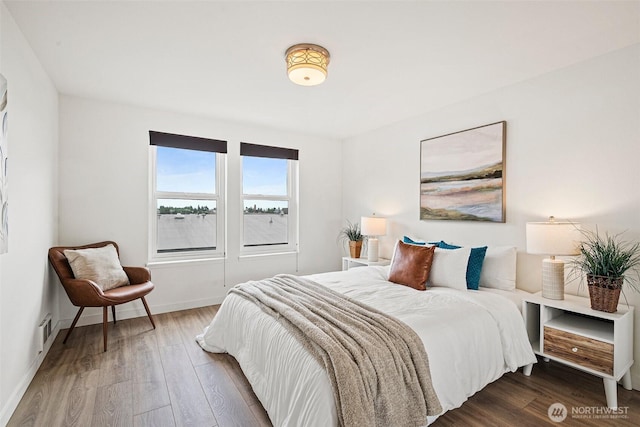 411 N 90th St Unit 406, Seattle, WA 98103 - bedroom with wood finished floors