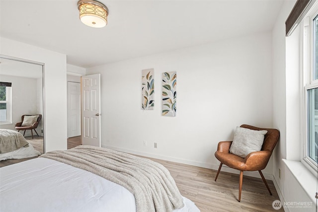 411 N 90th St Unit 406, Seattle, WA 98103 - bedroom featuring wood finished floors