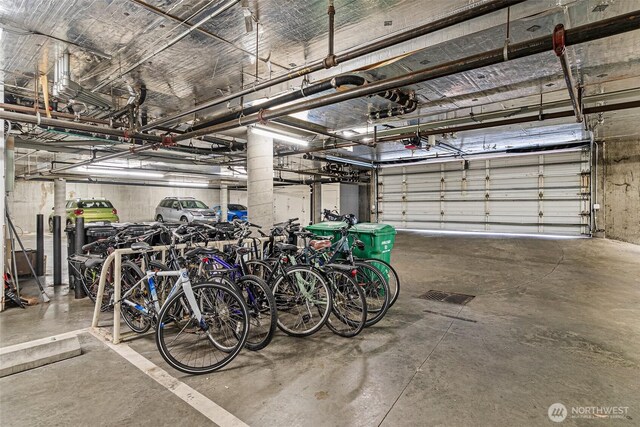 411 N 90th St Unit 406, Seattle, WA 98103 - garage with a garage door opener