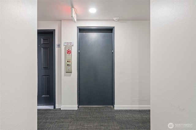 411 N 90th St Unit 406, Seattle, WA 98103 - hall with carpet and elevator