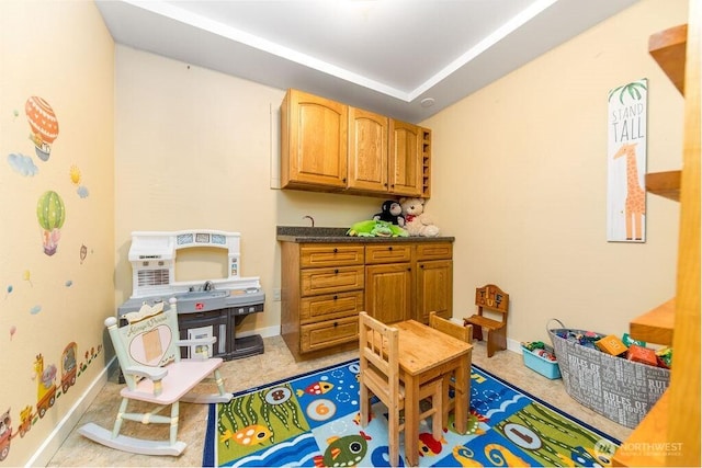 793 E Stadium Beach Rd W, Grapeview, WA 98546 - rec room featuring baseboards
