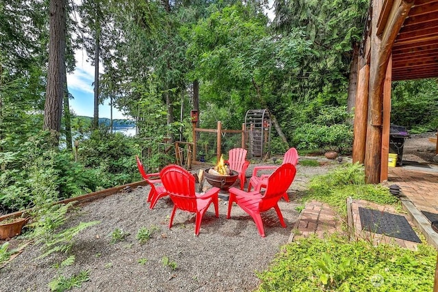 793 E Stadium Beach Rd W, Grapeview, WA 98546 - view of yard featuring an outdoor fire pit