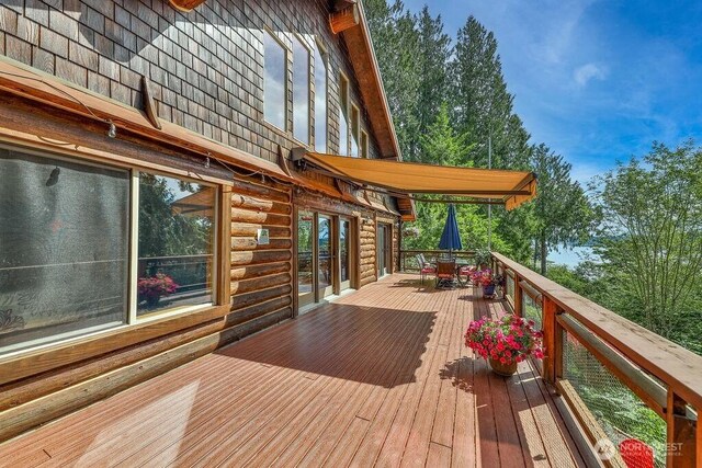 793 E Stadium Beach Rd W, Grapeview, WA 98546 - deck with outdoor dining area