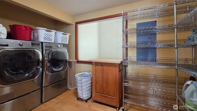 755 Ferry Rd, Lopez Island, WA 98261 - laundry room featuring separate washer and dryer and light wood-style floors