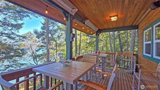 755 Ferry Rd, Lopez Island, WA 98261 - sunroom / solarium with outdoor dining space and rail lighting