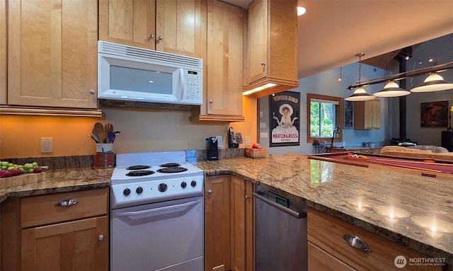 755 Ferry Rd, Lopez Island, WA 98261 - kitchen with white appliances, dark stone counters, hanging light fixtures, and a peninsula