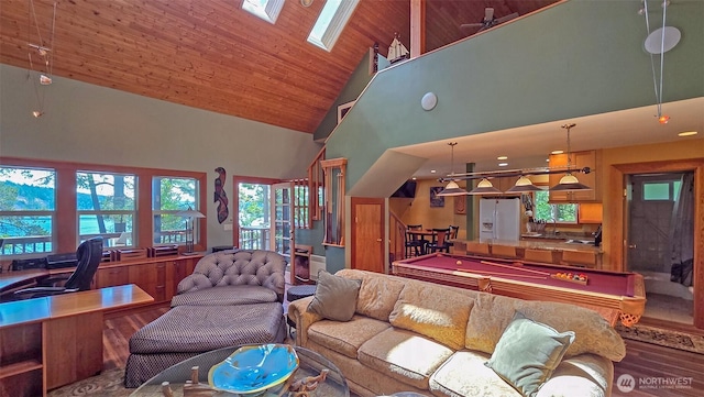 755 Ferry Rd, Lopez Island, WA 98261 - living room featuring wood finished floors, high vaulted ceiling, plenty of natural light, billiards, and a desk