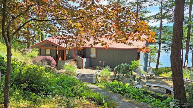 755 Ferry Rd, Lopez Island, WA 98261 - view of front facade featuring a metal roof