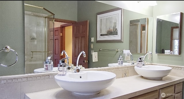 755 Ferry Rd, Lopez Island, WA 98261 - full bathroom featuring double vanity and a shower stall