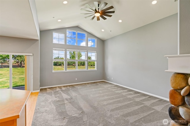 321 Range View Rd, Ellensburg, WA 98926 - unfurnished living room featuring plenty of natural light, carpet, ceiling fan, high vaulted ceiling, and recessed lighting