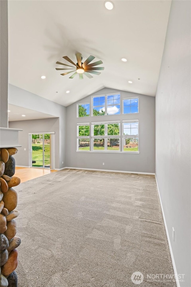 321 Range View Rd, Ellensburg, WA 98926 - unfurnished living room with carpet, lofted ceiling, ceiling fan, recessed lighting, and a fireplace