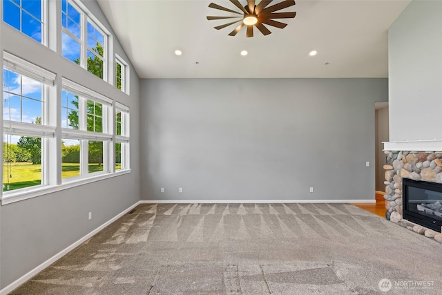 321 Range View Rd, Ellensburg, WA 98926 - unfurnished living room featuring ceiling fan, carpet floors, a stone fireplace, and recessed lighting