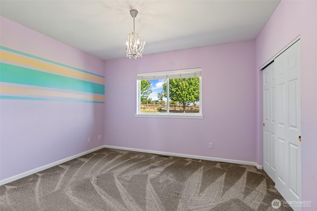 321 Range View Rd, Ellensburg, WA 98926 - carpeted spare room featuring a chandelier and baseboards