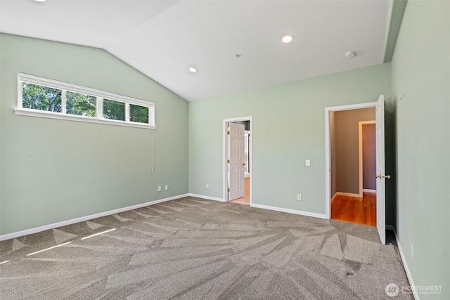 321 Range View Rd, Ellensburg, WA 98926 - unfurnished bedroom with carpet flooring, vaulted ceiling, ensuite bath, and recessed lighting
