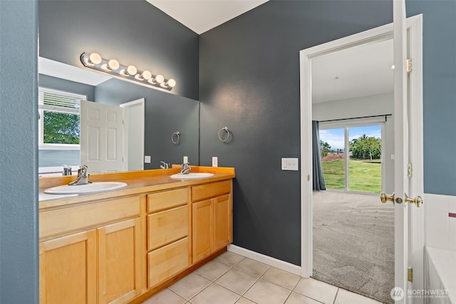 321 Range View Rd, Ellensburg, WA 98926 - full bath featuring tile patterned floors, double vanity, healthy amount of natural light, and a bathtub