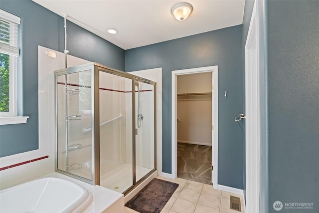 321 Range View Rd, Ellensburg, WA 98926 - full bath with a shower stall, tile patterned flooring, a spacious closet, and a garden tub