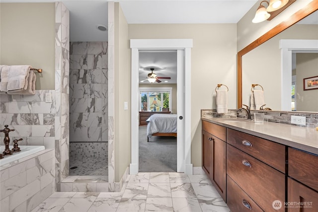 1605 Donovan Ave, Bellingham, WA 98225 - ensuite bathroom featuring marble finish flooring, vanity, tiled shower, and ceiling fan