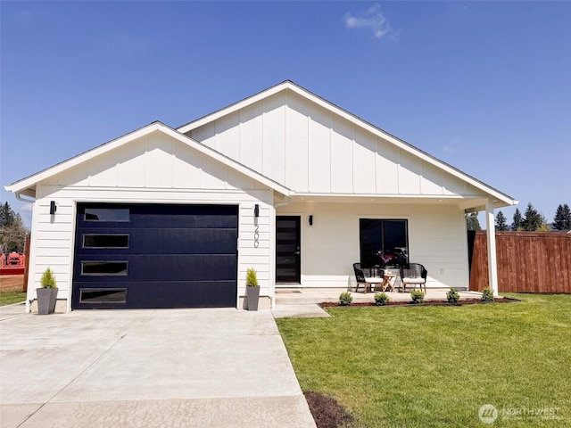 200 W Oak St, Yacolt, WA 98675 - view of front facade featuring driveway, an attached garage, and board and batten siding