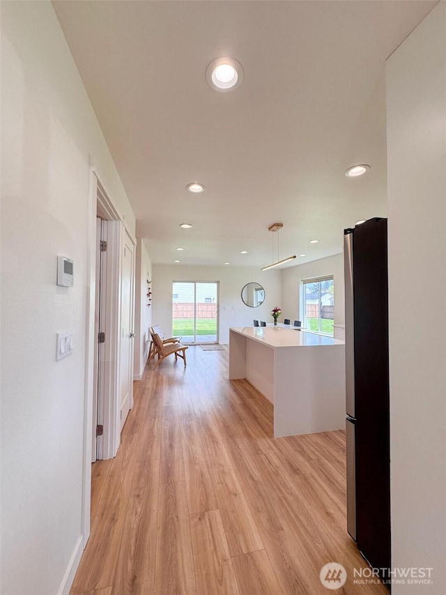 200 W Oak St, Yacolt, WA 98675 - hallway featuring light wood-style floors, plenty of natural light, and recessed lighting