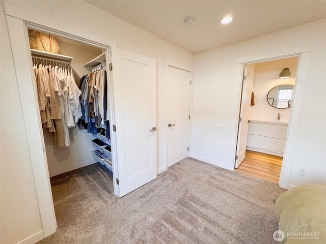 200 W Oak St, Yacolt, WA 98675 - unfurnished bedroom featuring carpet flooring, ensuite bathroom, a closet, a spacious closet, and recessed lighting
