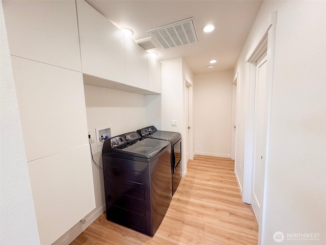 200 W Oak St, Yacolt, WA 98675 - laundry room with light wood finished floors, independent washer and dryer, and recessed lighting