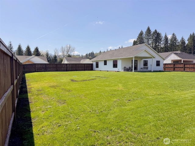 200 W Oak St, Yacolt, WA 98675 - rear view of house with a fenced backyard