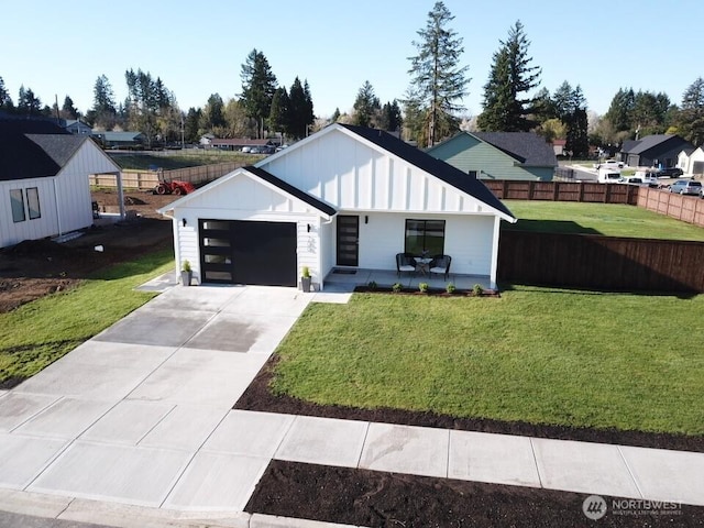 200 W Oak St, Yacolt, WA 98675 - modern inspired farmhouse featuring board and batten siding, a garage, driveway, and covered porch
