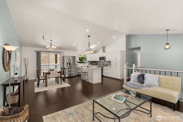35404 18th Ave SW, Federal Way, WA 99023 - living area featuring a chandelier, dark wood-style flooring, high vaulted ceiling, and recessed lighting