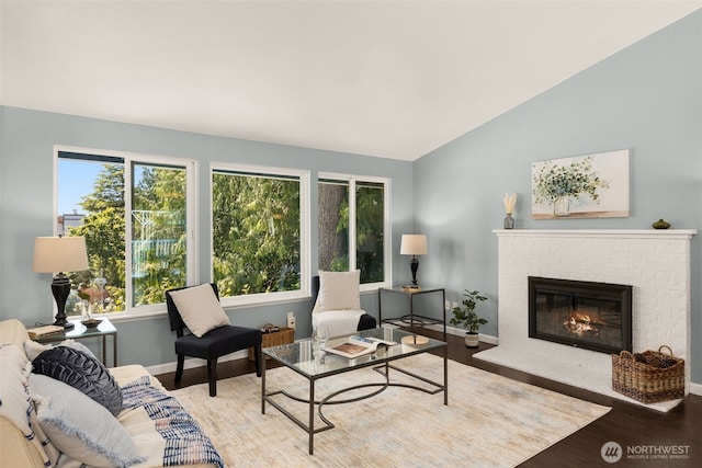 35404 18th Ave SW, Federal Way, WA 99023 - living room with wood finished floors, a fireplace, and lofted ceiling