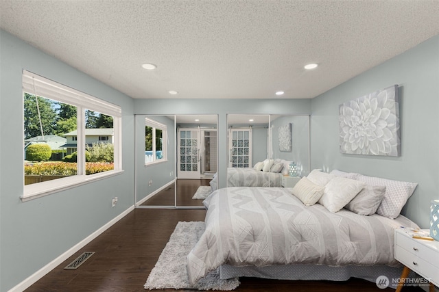 35404 18th Ave SW, Federal Way, WA 99023 - bedroom with wood finished floors, recessed lighting, a textured ceiling, and access to exterior