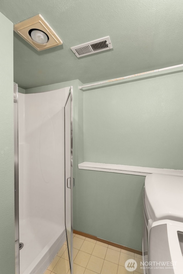 35404 18th Ave SW, Federal Way, WA 99023 - bathroom with a stall shower and tile patterned flooring