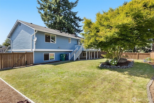 35404 18th Ave SW, Federal Way, WA 99023 - rear view of property with stairs, a fenced backyard, and a wooden deck