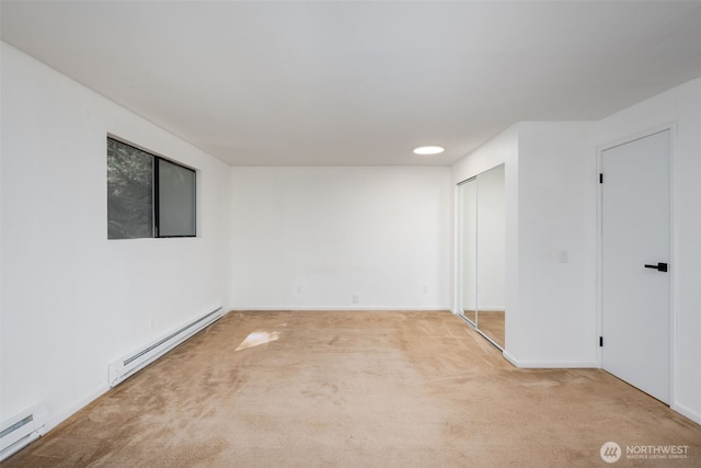 6 Hillside Pl, Bellingham, WA 98229 - spare room with a baseboard radiator, baseboard heating, and carpet flooring