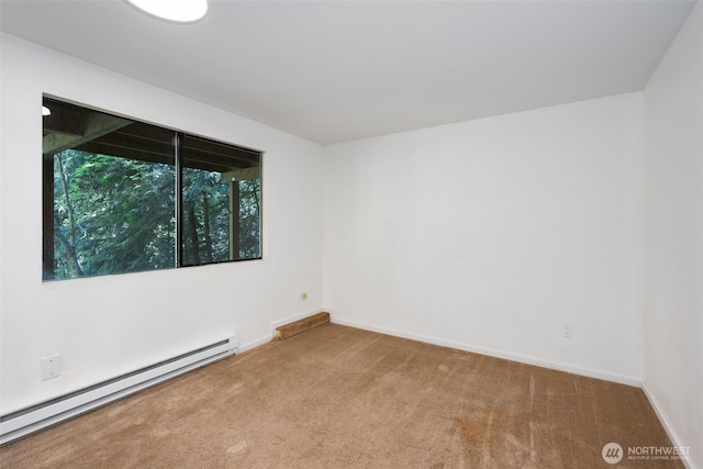 6 Hillside Pl, Bellingham, WA 98229 - carpeted empty room with a baseboard heating unit and baseboards