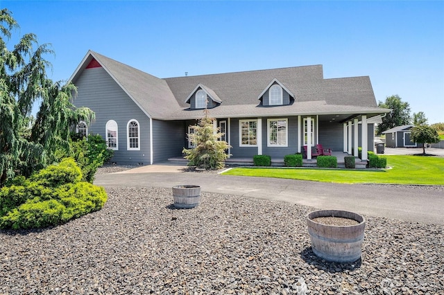 10391 Rd 5.6 NE, Moses Lake, WA 98837 - view of front of property with a porch and a front lawn