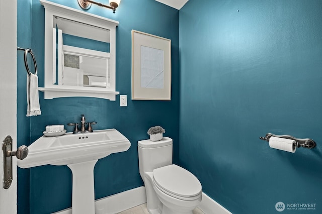 2159 10th Ave W, Seattle, WA 98119 - bathroom with baseboards and tile patterned flooring