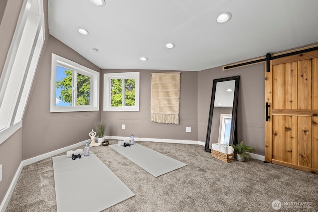 2159 10th Ave W, Seattle, WA 98119 - workout room with carpet flooring, recessed lighting, a barn door, and lofted ceiling