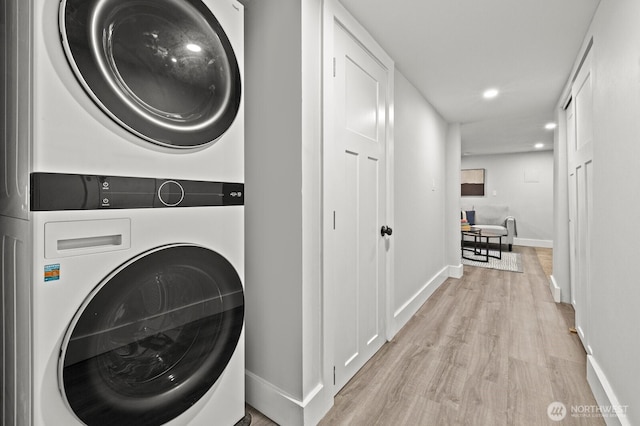 2159 10th Ave W, Seattle, WA 98119 - washroom with stacked washer / drying machine, wood finished floors, and recessed lighting
